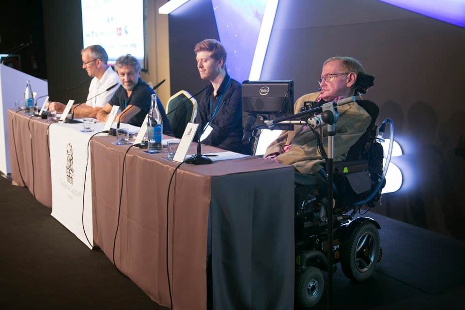 Grig with Hawking at press conference.jpg