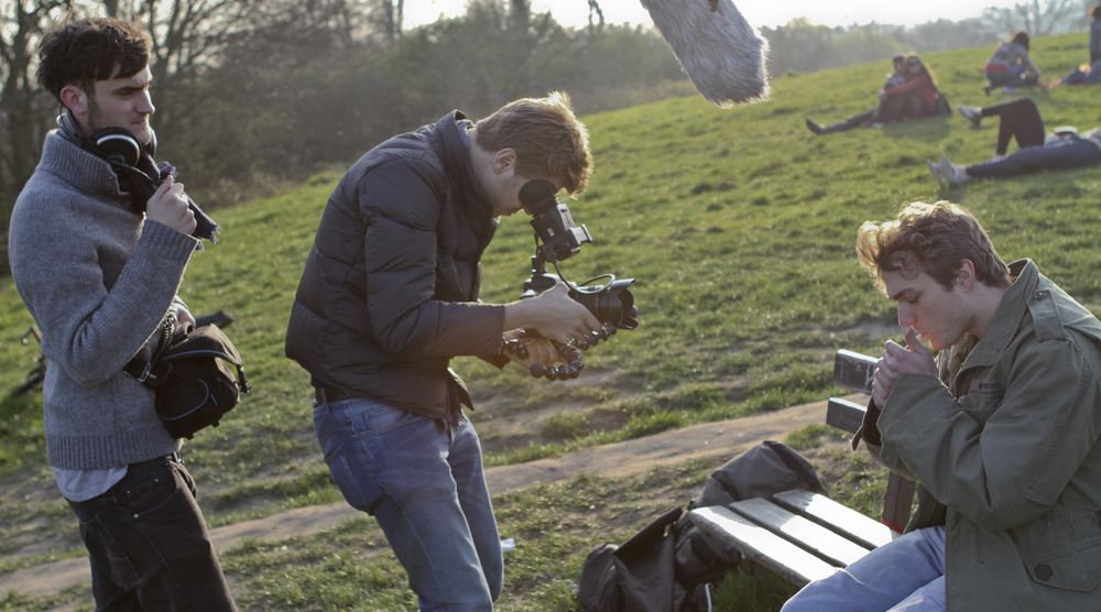 Director filming Damon smoking a joint, Associate Producer behind.jpg