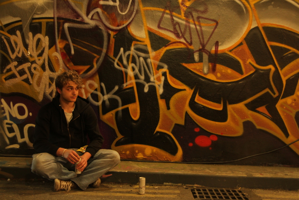 Damon in front of Graffiti.JPG